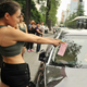 Illustration for article titled Chinese Lara Croft Lookalikes Handing Out Traffic Warnings in Hotpants